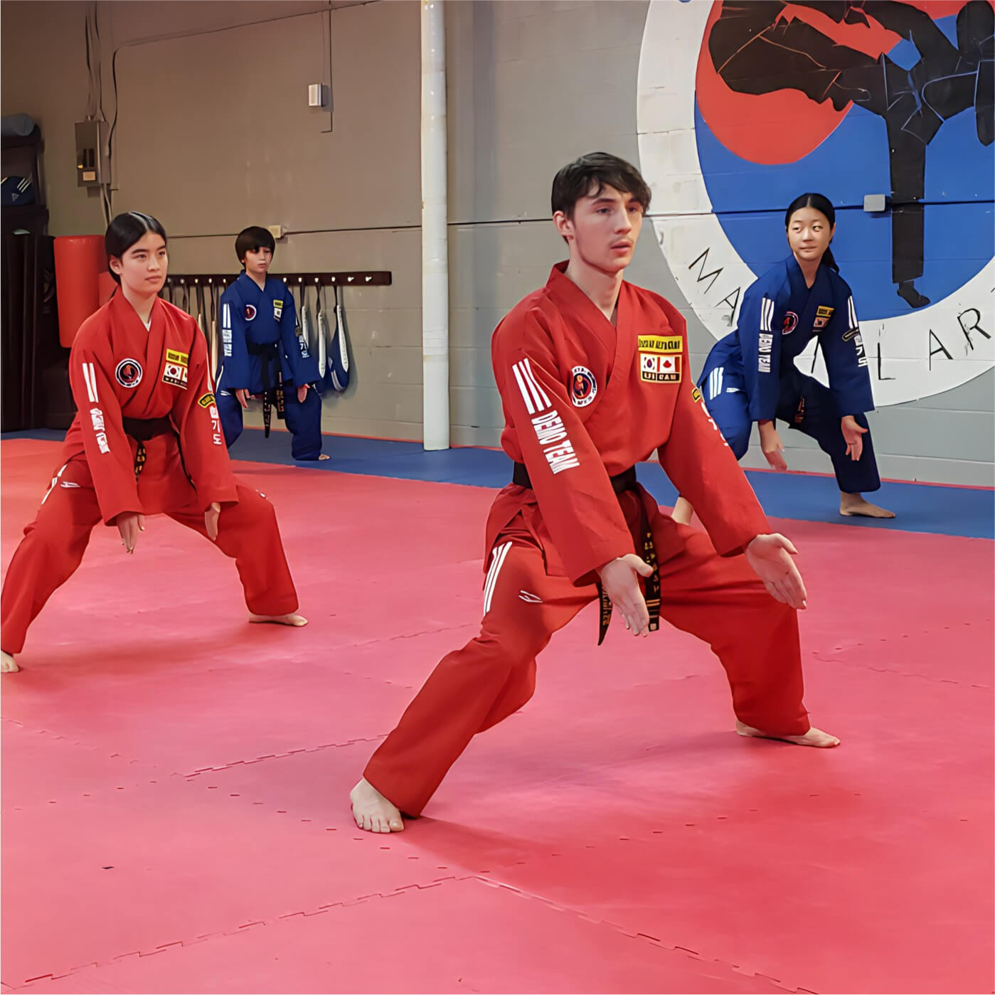 teen student being encouraged and supported by instructor Hong's hapkido school class sample picture in well reviewed martial arts in Maple Ridge Vancouver Canada